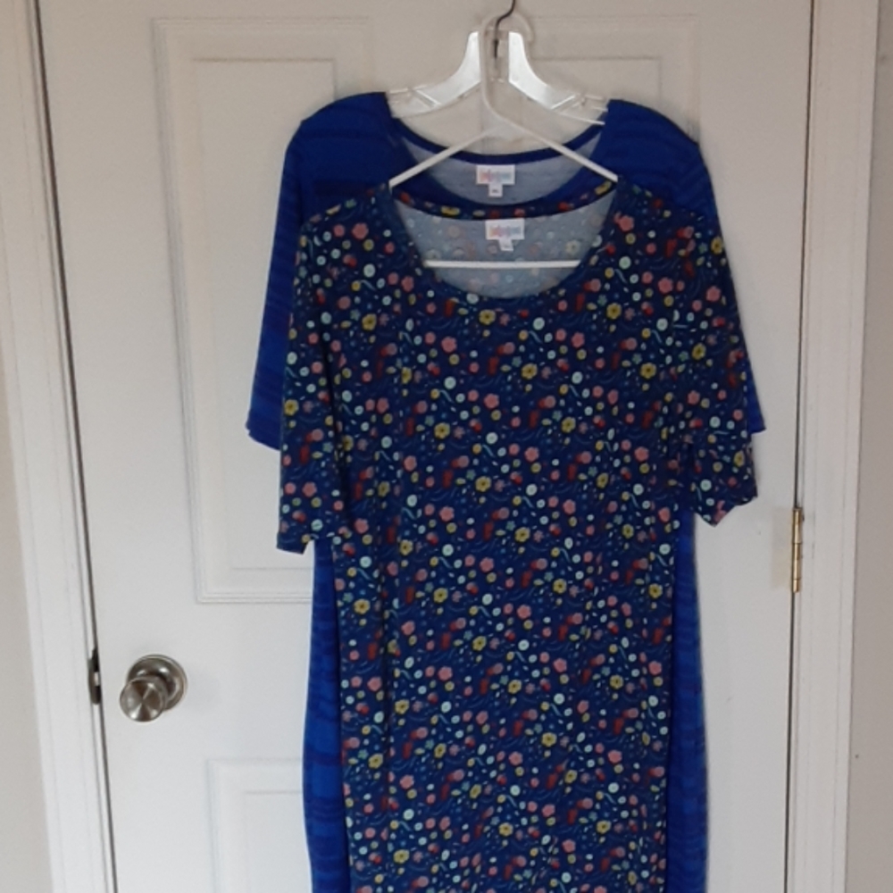 2 lularoe dresses in blue, one is a large and xl